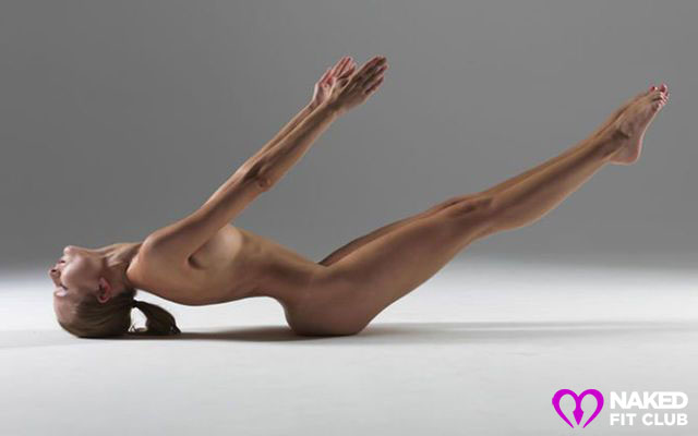 Naked fitness girl sideways arching her back yoga pose.